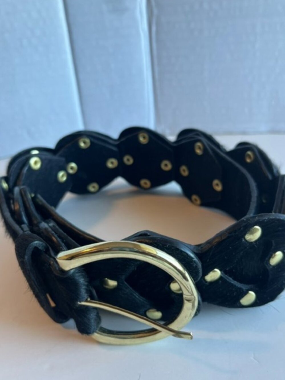 Calf hair studded women’s leather belt.